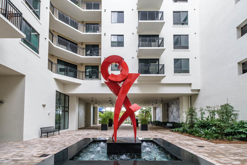 Altis Ludlam Trail exterior fountain with sculpture